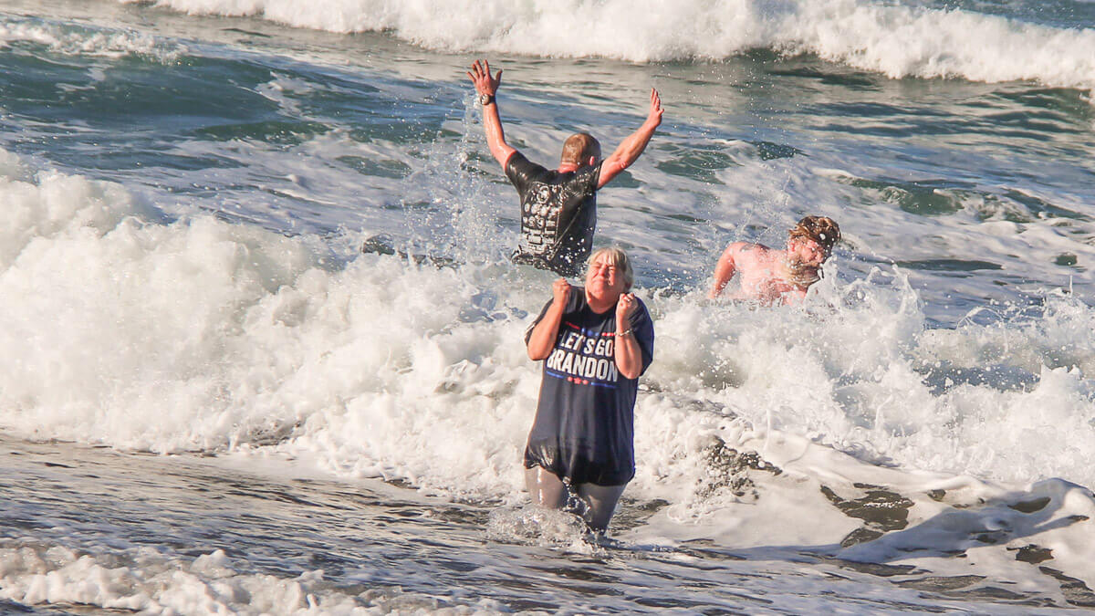 Participants plunging into the ocean.