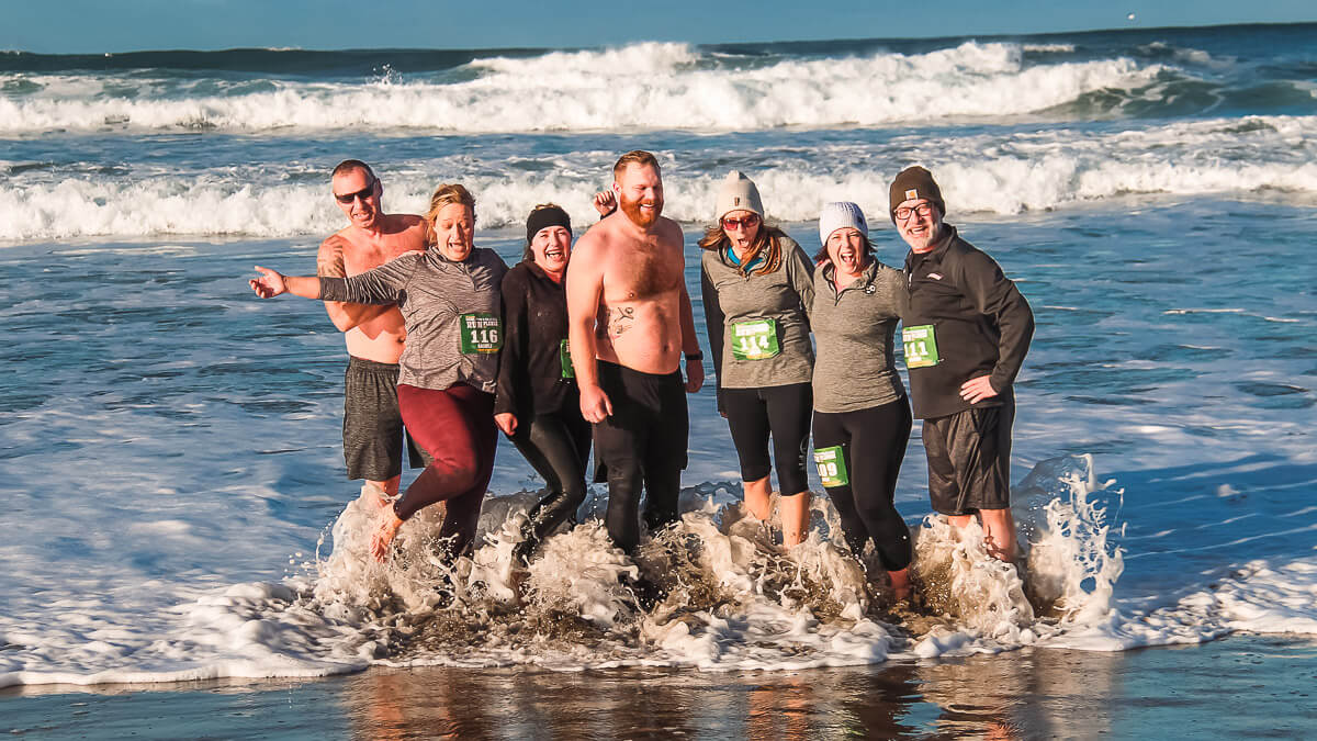 Participants plunging into the ocean.