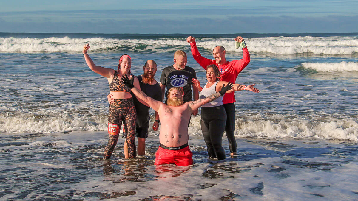 Participants plunging into the ocean.