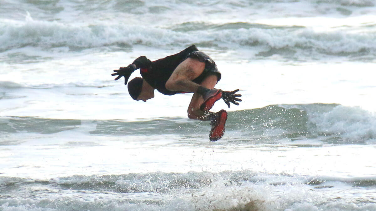 Participants plunging into the ocean.