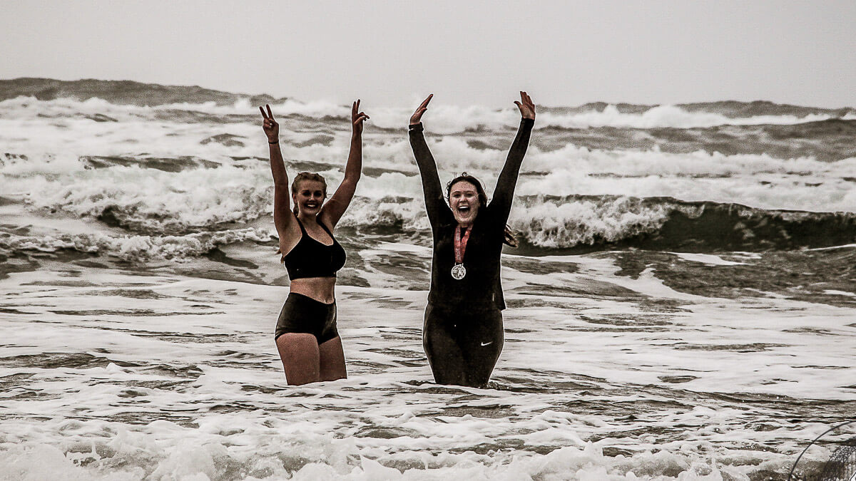 Participants plunging into the ocean.