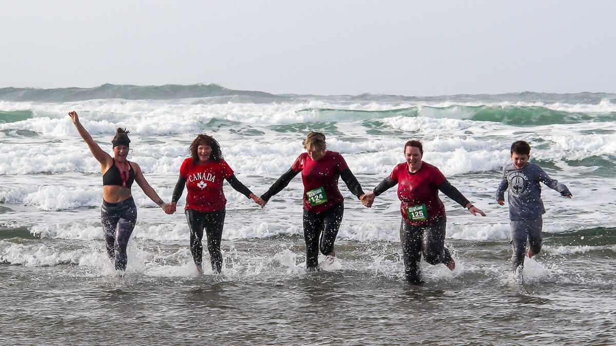 Participants plunging into the ocean.